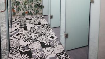 Shower, hair dryer, slippers, towels