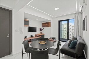 Superior Apartment | Living area | 40-inch flat-screen TV with satellite channels