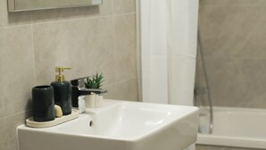 Hair dryer, towels, soap, toilet paper