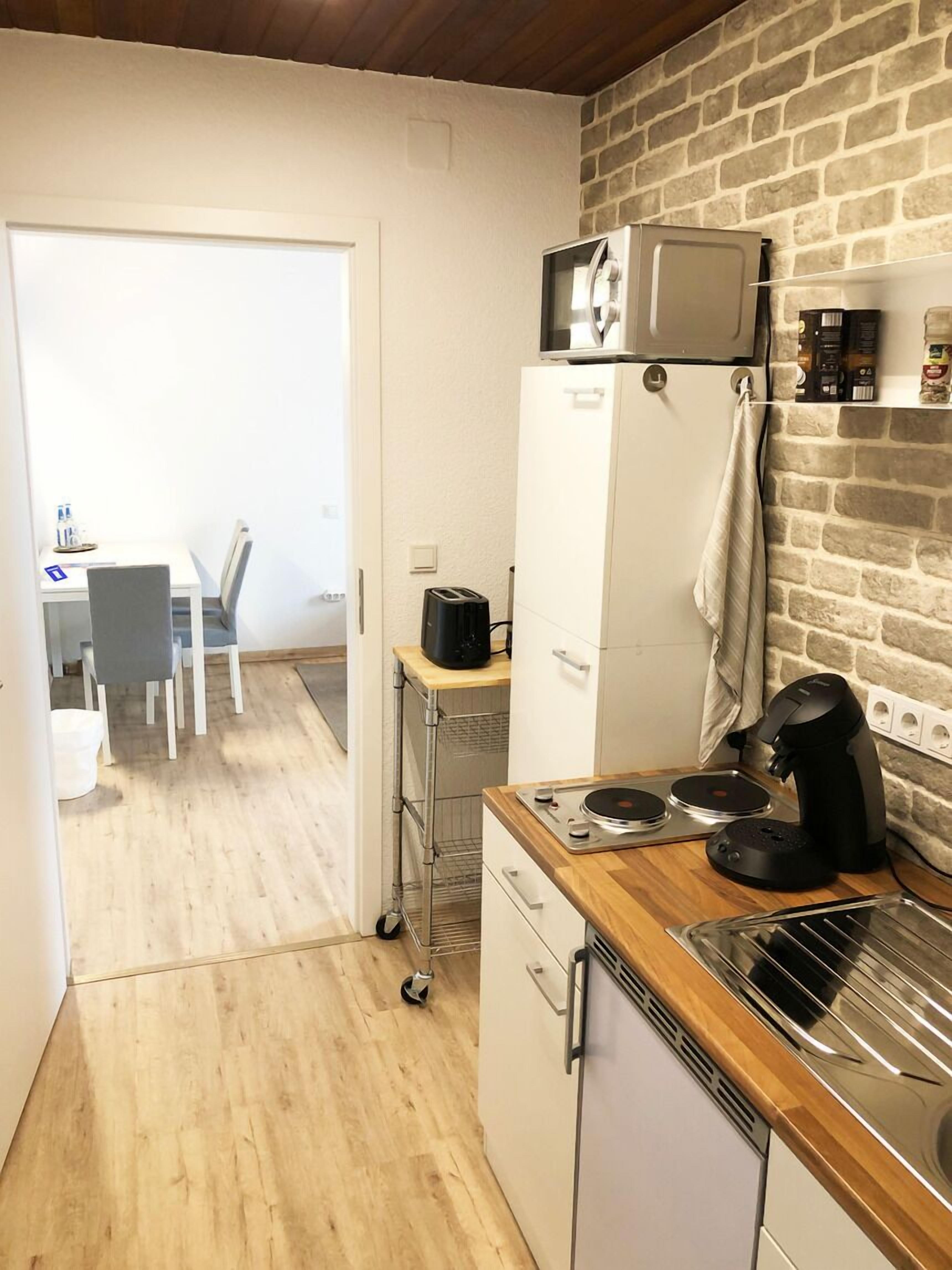 Suite Confort, baño privado | 1 habitación, caja de seguridad en la habitación y cunas gratuitas 