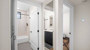 Shower, eco-friendly toiletries, hair dryer, towels