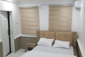 1 slaapkamer, een strijkplank/strijkijzer, wifi, beddengoed