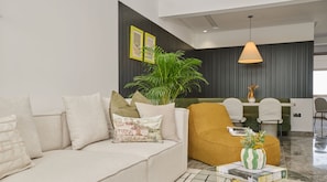 Deluxe Apartment | Living area | 60-inch Smart TV with digital channels, Netflix, streaming services