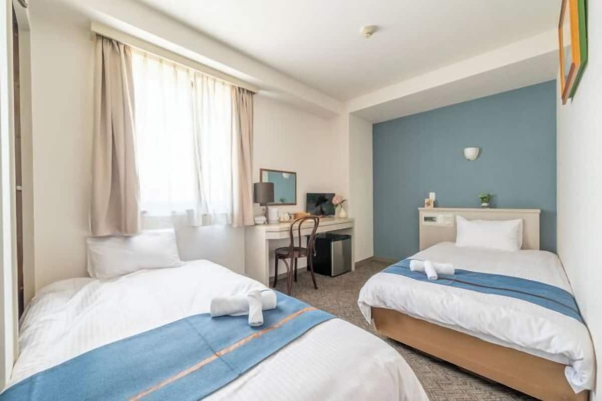 Desk, laptop workspace, blackout curtains, soundproofing