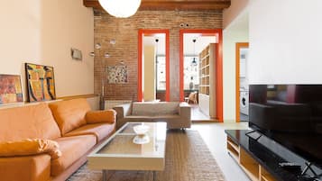 Apartamento | Área de estar | TV de tela plana 50 cm com canais a cabo