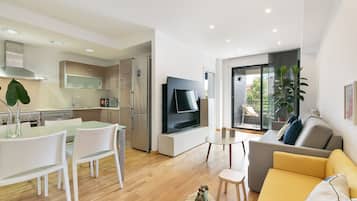 Apartament | Sala d'estar | Televisor de 50 cm amb canals per cable