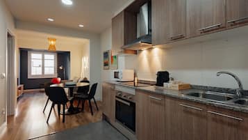 Apartment | Private kitchen | Microwave, oven, coffee/tea maker, high chair