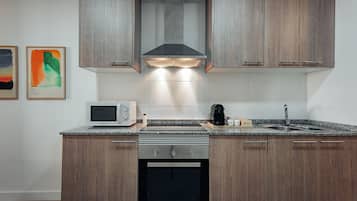 Apartment | Private kitchen | Microwave, oven, coffee/tea maker, high chair