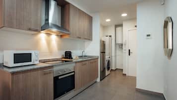 Appartement | Privékeuken | Een magnetron, een oven, een koffiezetapparaat/waterkoker