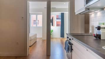 Apartamento | Cozinha privada | Micro-ondas, fogão, cafeteira/chaleira, cadeirão de bebê