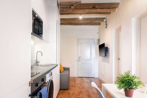 Departamento | Área de sala de estar | Televisión de 50 cm con canales por cable 