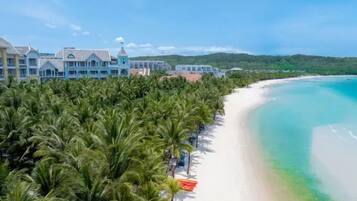 On the beach, white sand, free beach shuttle, 3 beach bars