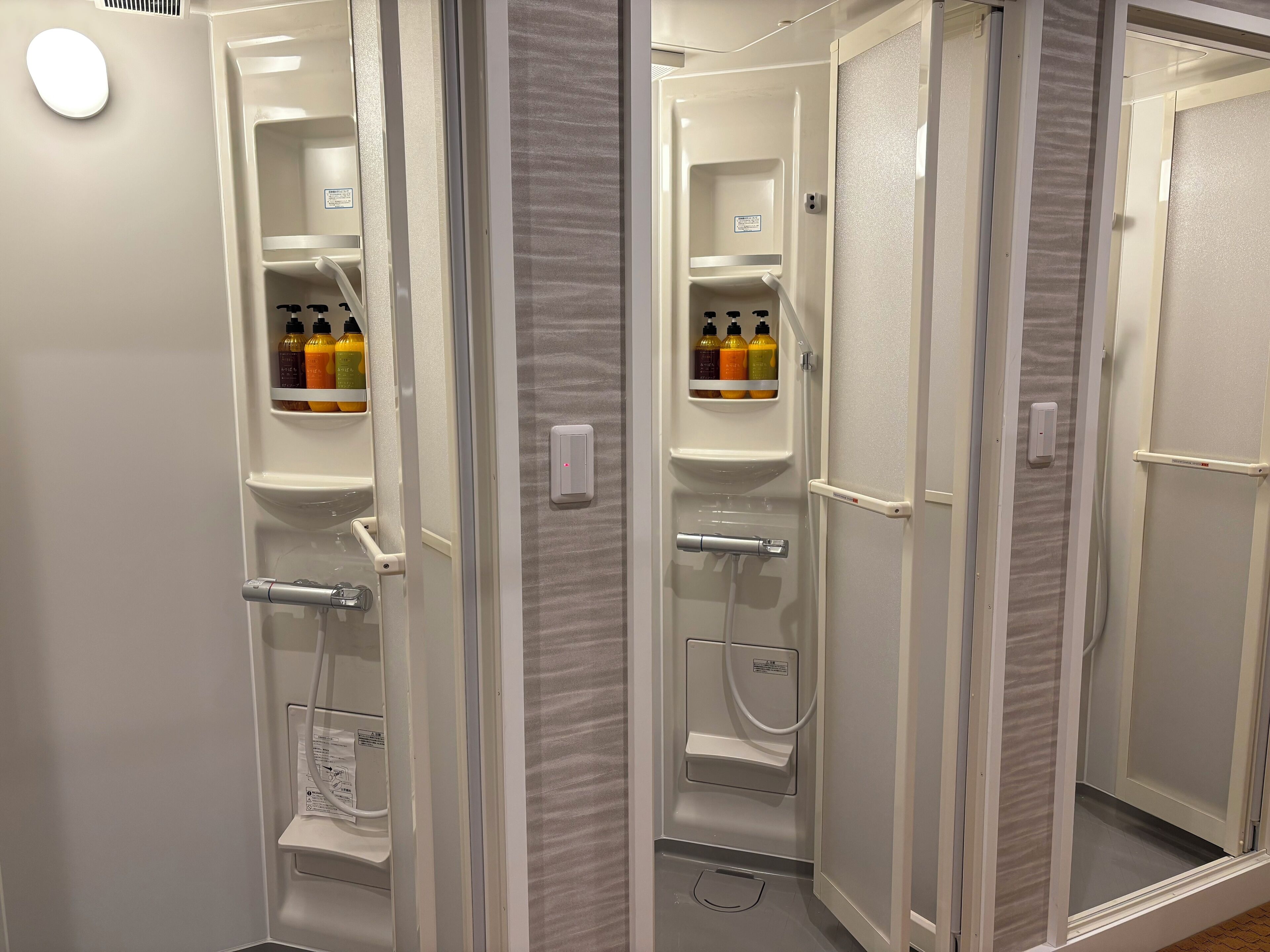 Shower, free toiletries, hair dryer, slippers