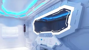 A futuristic room with a large digital display and a control panel. - Capsule Hotel Nagasaki (Nagasaki)