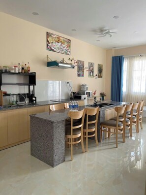 Villa Deluxe, balcon, vue jardin | Coin séjour