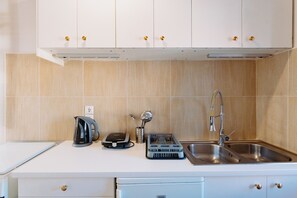 Oven, stovetop, electric kettle, highchair