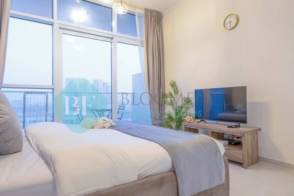 Coffres-forts dans les chambres, fer et planche à repasser