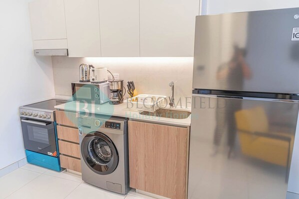 Fridge, microwave, oven, electric kettle