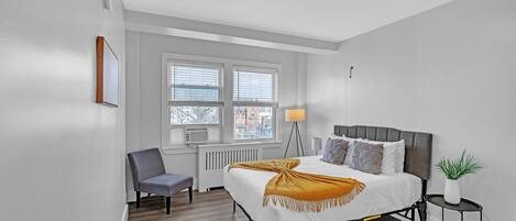 1 bedroom, desk, iron/ironing board, travel cot
