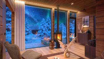 Deluxe-Chalet, Parkblick (Arctic Sky Villa) | Wohnbereich | Fernseher