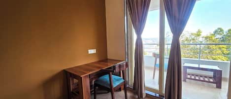 Chambre Double Deluxe | Coin séjour