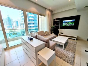 Smart TV - Sunrise Homes - A Modern Studio next to JBR Walk and Beach (Dubai)