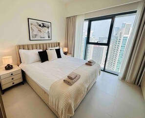 1 bedroom, desk, iron/ironing board, travel crib