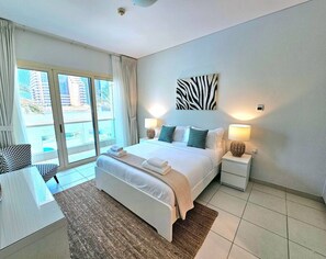 1 bedroom, desk, iron/ironing board, travel crib