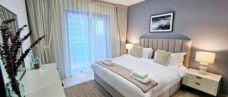 1 bedroom, desk, iron/ironing board, travel crib