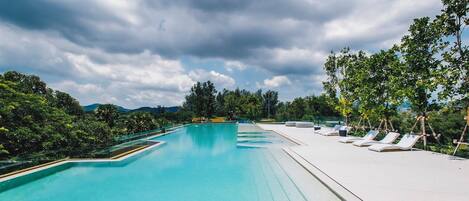 Outdoor pool, pool umbrellas, pool loungers