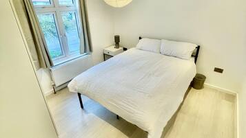 2 habitaciones, tabla de planchar con plancha, wifi y ropa de cama