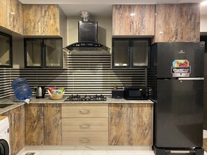 Fridge, microwave, stovetop, electric kettle