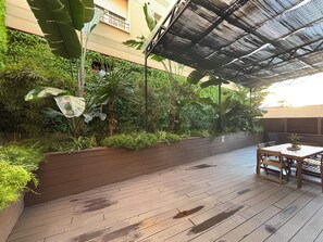 Appartement Supérieur, vue jardin | Terrasse/Patio