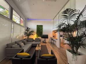 Appartement Supérieur, vue jardin | Coin séjour