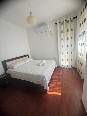 Departamento | 1 habitación, tabla de planchar con plancha, wifi gratis y ropa de cama 