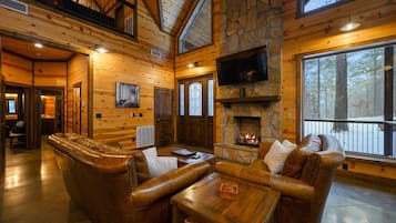 Cabin, Multiple Beds, Hot Tub, Garden View (Logged Out) | Living area | 42-inch flat-screen TV with digital channels, fireplace