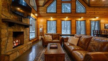 Cabin, Multiple Beds, Hot Tub, Garden View (Logged Out) | Living area | 42-inch flat-screen TV with digital channels, fireplace