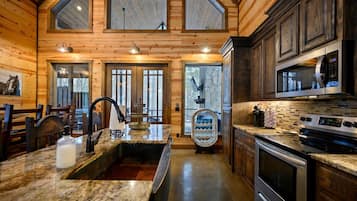 Cabin, Multiple Beds, Hot Tub, Garden View (Logged Out) | Private kitchen | Fridge, microwave, oven, stovetop