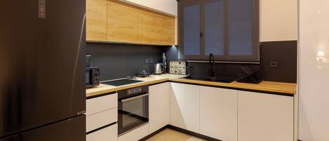 Apartament de luxe, balcó, vistes a la ciutat | Cuina privada