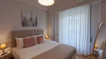 Appartement luxueux, balcon, vue sur la ville | 3 chambres, coffre-fort, rideaux d’obscurcissement