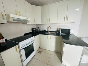 Fridge, microwave, oven, stovetop