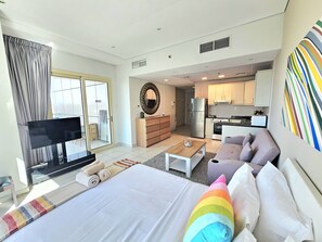 1 bedroom, desk, iron/ironing board, travel crib