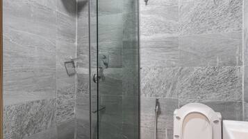 Shower, bidet, towels, soap