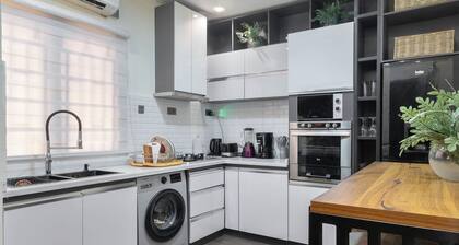 Cozy & Stylish 2BR Bungalow with AC, WiFi & 24/7 Power & Full Kitchen in Lagos.