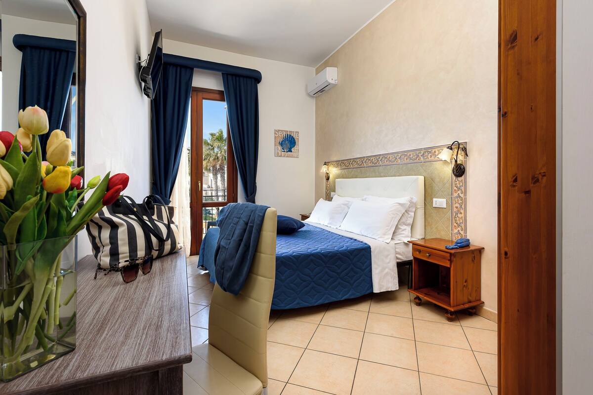 Double Room, Balcony, City View | 1 bedroom, in-room safe, desk, blackout drapes