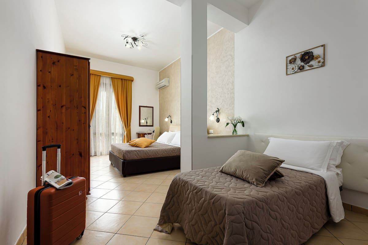 Comfort Triple Room | 1 bedroom, in-room safe, desk, blackout drapes