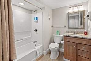 Shower, jetted bath, hair dryer, towels