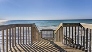A wooden boardwalk leading to a beach with a clear sky. - Walk to Beach: Resort Retreat w/ Balcony in Destin (Destin)
