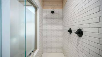 Cabin, Multiple Beds, Hot Tub, Garden View (Stardust Hollow) | Bathroom | Hair dryer, towels