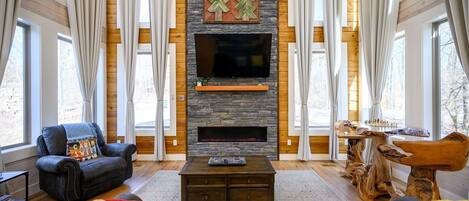 Cabin, Multiple Beds, Hot Tub, Garden View (Stardust Hollow) | Living area | 55-inch flat-screen TV with digital channels, fireplace